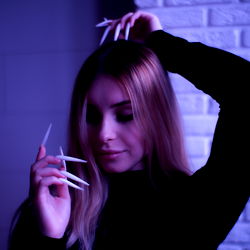 Alinalol Posing with Manicure Claws and Finger Snaps