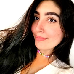 Andrea Franco, a young, stylish model posing for the camera