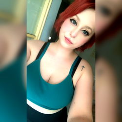 Nikki, Fitness Enthusiast in Sports Bra, Tattoo and Nail Polish