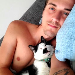 A Tender Moment with a Cat and the OnlyFans Creator Padraig