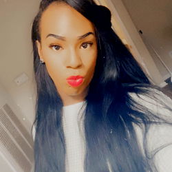 Ashley, a Miami-based OnlyFans model captures attention with her confident gaze and glossy locks.