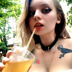 Alana Kitty, the OnlyFans Model with a Straw in Her Hand