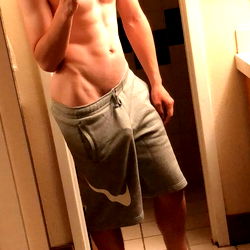 Shirtless Fitness Model in Bathroom Mirror with OnlyFans Handle