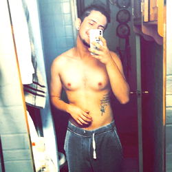 Social Media Influencer in Bathrobe and Tattoo