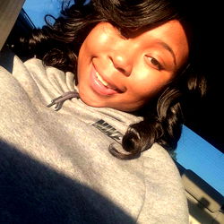 Fashionable Onlyfans Model Alexis Striking a Pose in Car