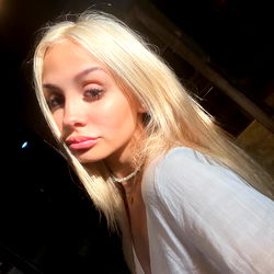 Katie's Blond Beauty in White Outfit