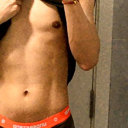 Fitness Model Foxx Showcasing Abs