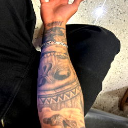 Inked Arm Sleeve Tattoo