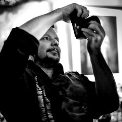 Casually Dressed Man Taking a Selfie