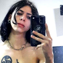 Atheno, a Model with Distinct Style and Tattoos