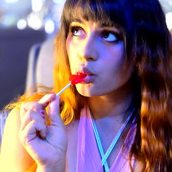 Joselynsweet ❤️, model, poses with a lollipop