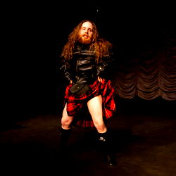 Syd Thunder, a Model in Costume on Stage