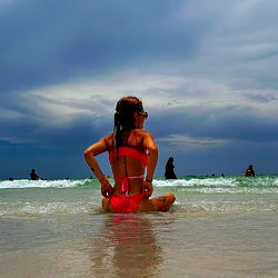 Caedence in a Red Bikini at the Beach