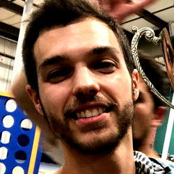 Athletic Man in Gym with Dartboard