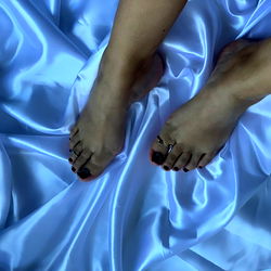 OnlyFans Model 'Moon Feet' Poses in Sheer Blue Bedding