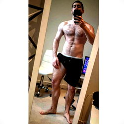 Fitness Enthusiast Showcases His Abs