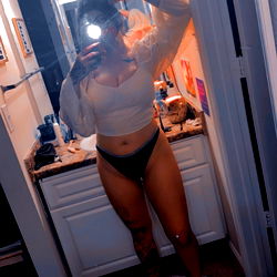 Allison, a stunning model in her bathroom