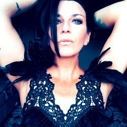 Model in Elegant Feathered Gown