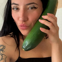 OnlyFans Model Laara with Cucumber in Mouth