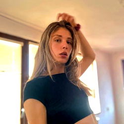 Blonde Model in Black Tank Top, Brushing Hair