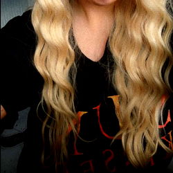 Blonde with tongue piercing