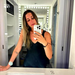 Beautiful Model Posing in Bathroom Mirror