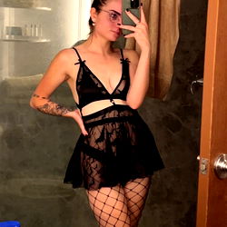 Bell 🌻🖤 in a Bathroom