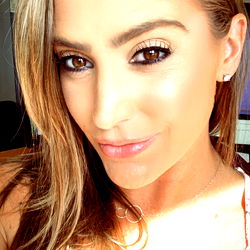 A captivating portrait of Krista Devins - OnlyFans model - against a serene backdrop