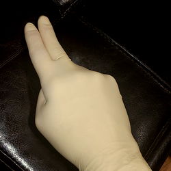 Hand in Medical Glove
