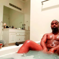 An OnlyFans Model in a Bath