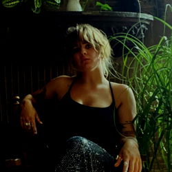 Ali in a Stylish, Plant-Themed Setting