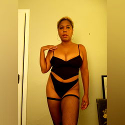 Muse DeJean, Erotic Model in Lingerie and Fishnet Panties