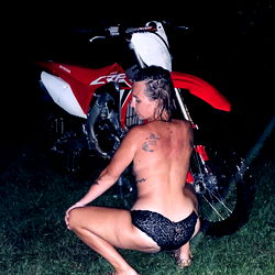 Onlyfans Model Poses with Dirt Bike