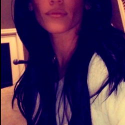 Alyssa, a stunning OnlyFans model with long hair and striking features