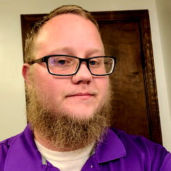 Indiana Man with Beard and Glasses in Purple Shirt