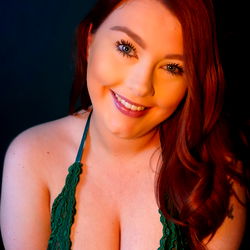 AmberOFxxx - Gorgeous Redhead in a Green Bikini Posing for the Camera