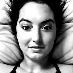 Woman with short hair in black and white