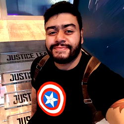 Man Smiling in Justice League T-Shirt