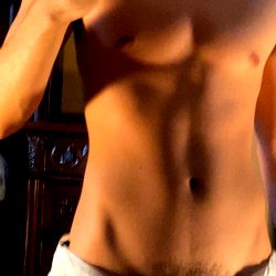 Adonay Fitness Model Showcasing Abs