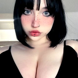 Vivid and Stylish Female Model Nikkita Goth Showcasing Gender-Neutral Fashion