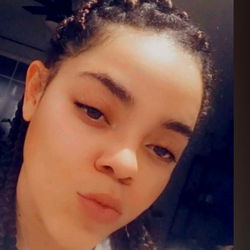 BaByMonkey143, a 25-year-old female with unique hairstyles and makeup.