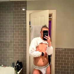 Curated Filth in Bathroom Mirror