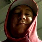 Person in Hoodie with Mask on Face