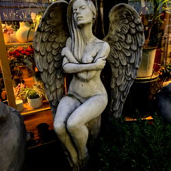 Sculpture of Scarlet, a Fans Model, in a Store Display