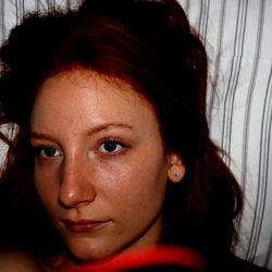 OnlyFans Model in a Cozy Bedroom Setting