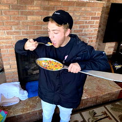 A model enjoying a cereal snack