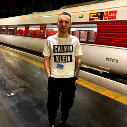 Casually Dressed Man at Train Station