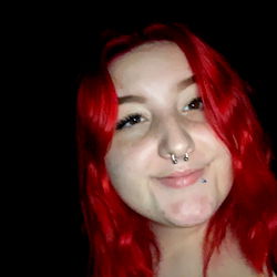 Charlie, A Model Sharing Her Red Hair Moment