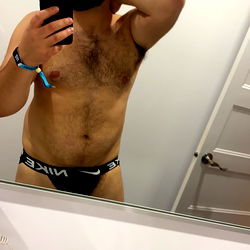 OnlyFans Model in a Unique Pose for Promotion