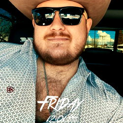 Ashton Haynes in a Cowboy Hat and Sunglasses, Holding Truck